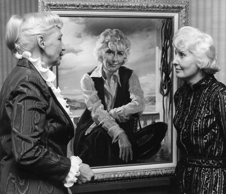 Bettina Steink and Barbara Stanwyck with commissioned portrait of Stanwyck by Steinke